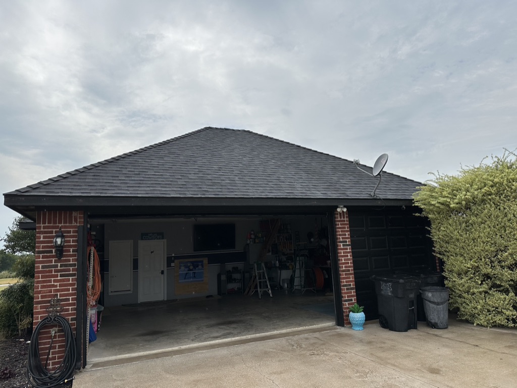 Black Shingle Roof On A Brick Home photo 21