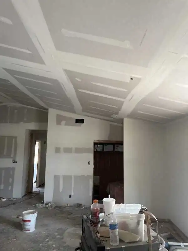 W2 Construction drywall finishing work inside a Johnson County home