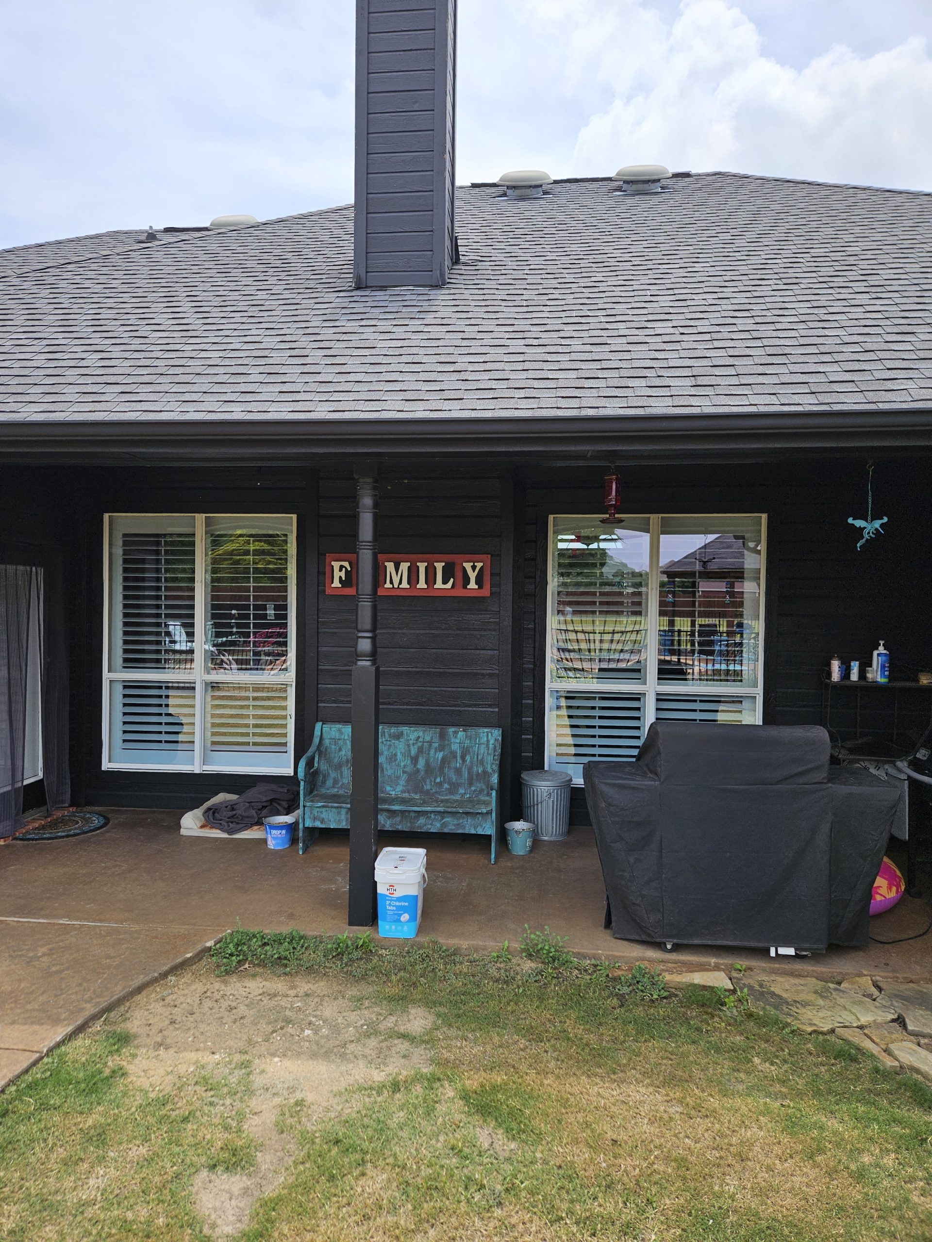 Black Shingle Roof On A Brick Home photo 14