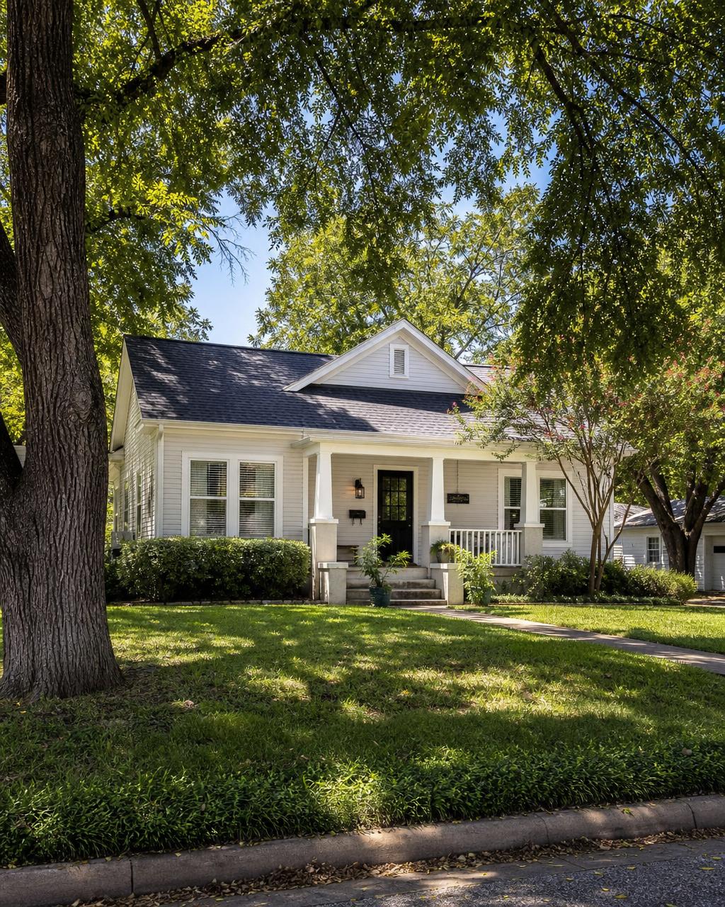 New roof and fresh trim on an older cottage style home in Keene, TX