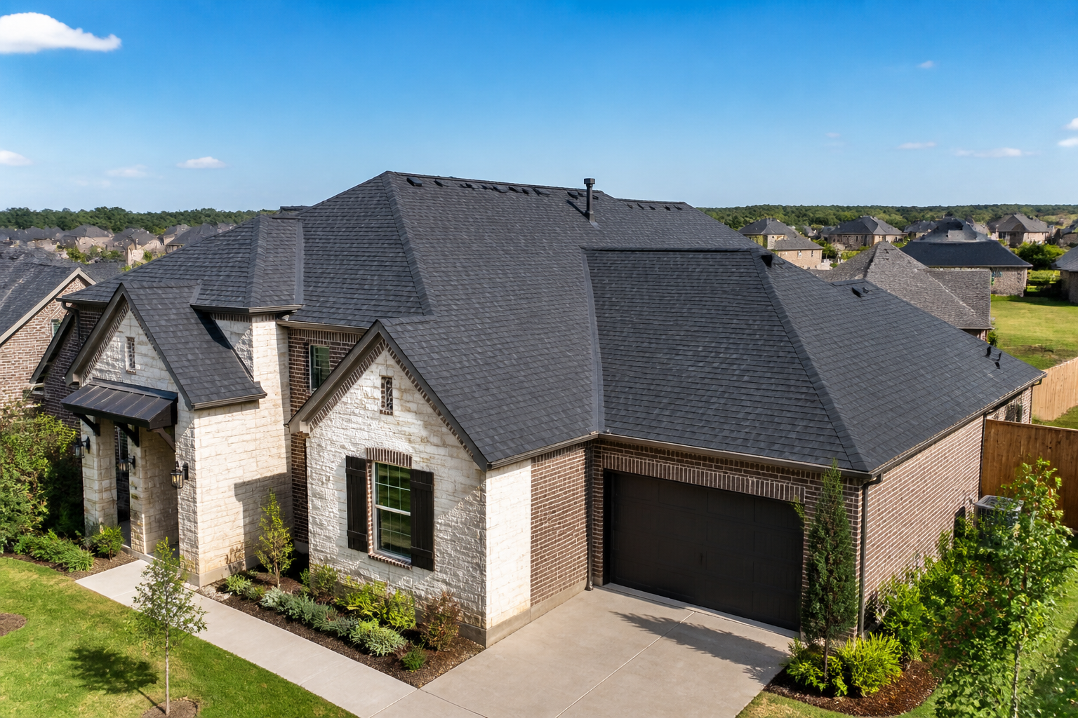 A Johnson County home with a new roof installed by W2 Construction